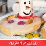 Close up of a vegan melted snowman cookie.