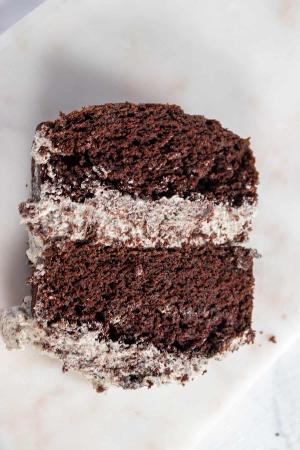 An aerial shot of my vegan oreo cake. There's a thick layer or oreo buttercream in the middle.