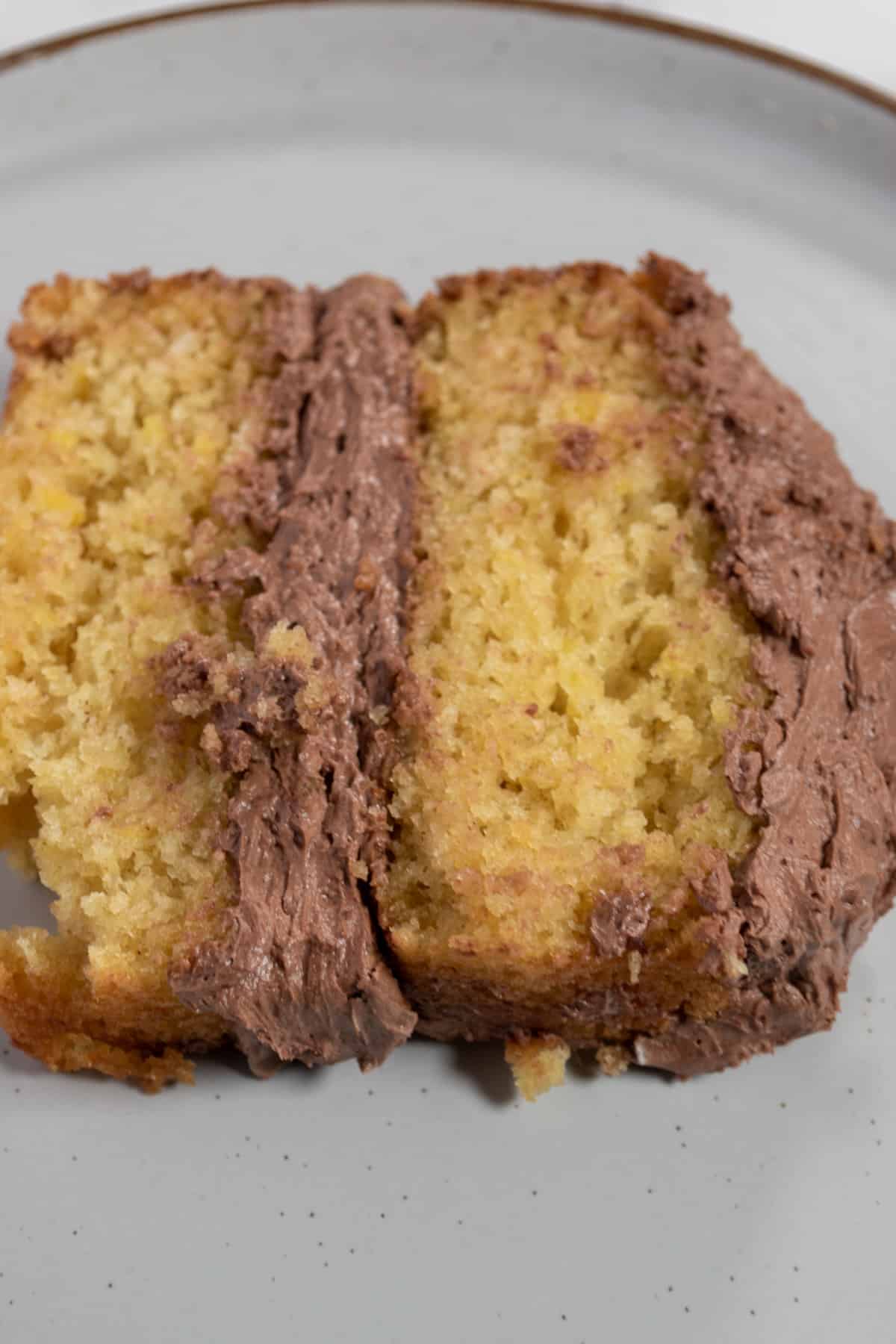 A close up shot of my chocolate lemon cake, filled with creamy frosting. 