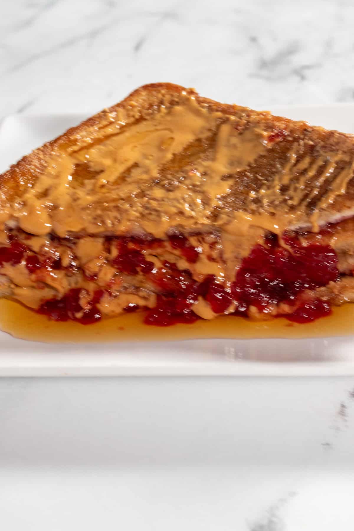 A close up of my vegan peanut butter and jelly french toast.