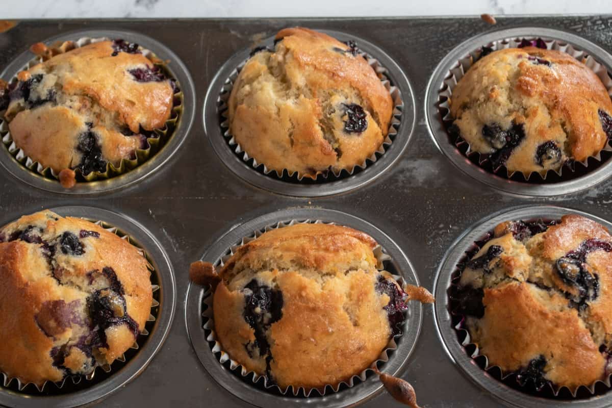 The pistachio muffins are baked and cooling. Golden brown and delicious. 