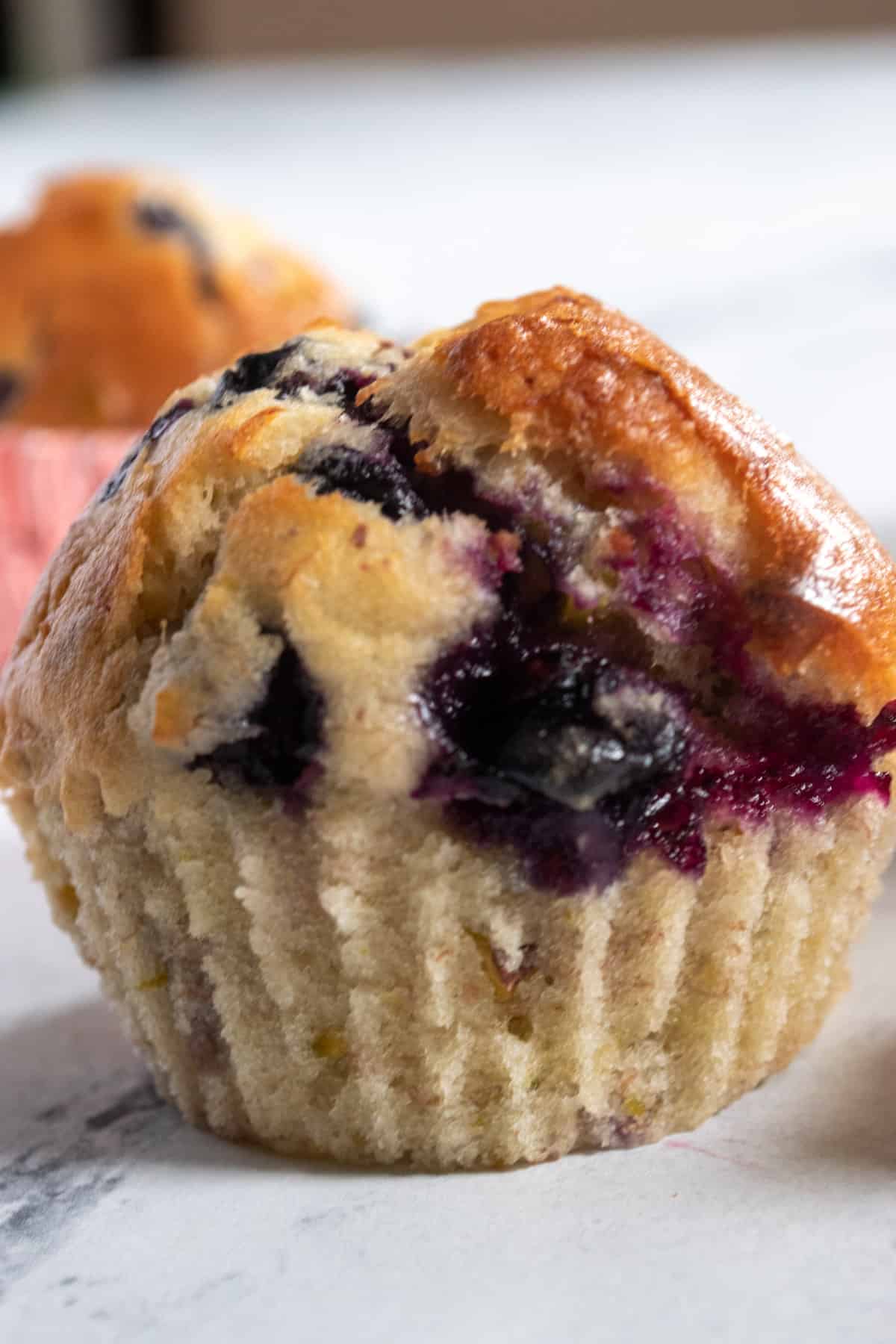 A super zoomed in photo of a muffin. 