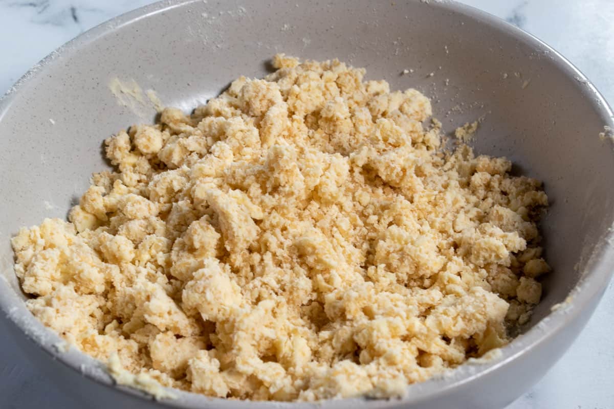 The streusel is crumbly and the ingredients have been fully combined.