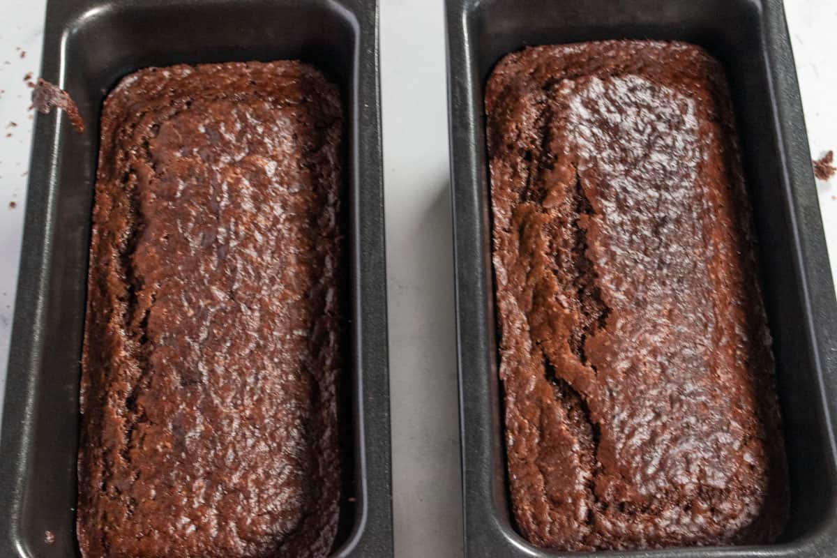 The cakes cooling in the tins. 