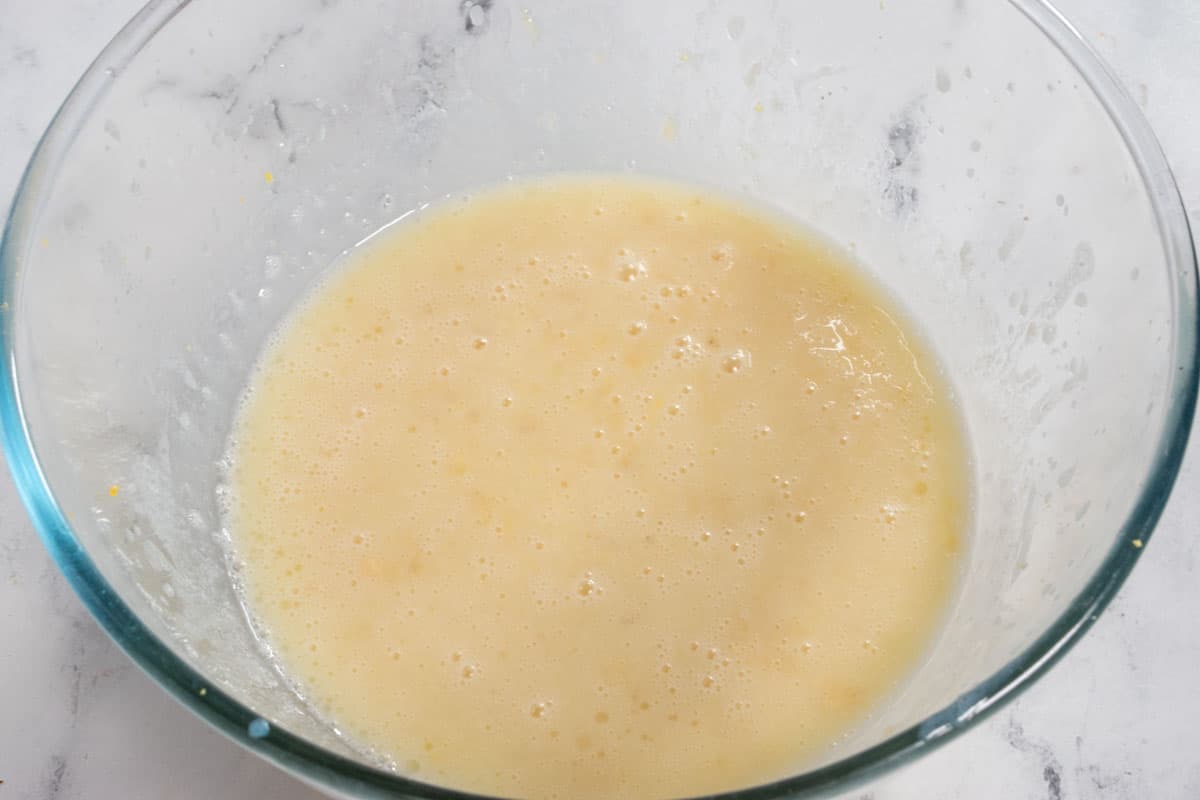 The wet ingredients whisked together inside a large bowl. 