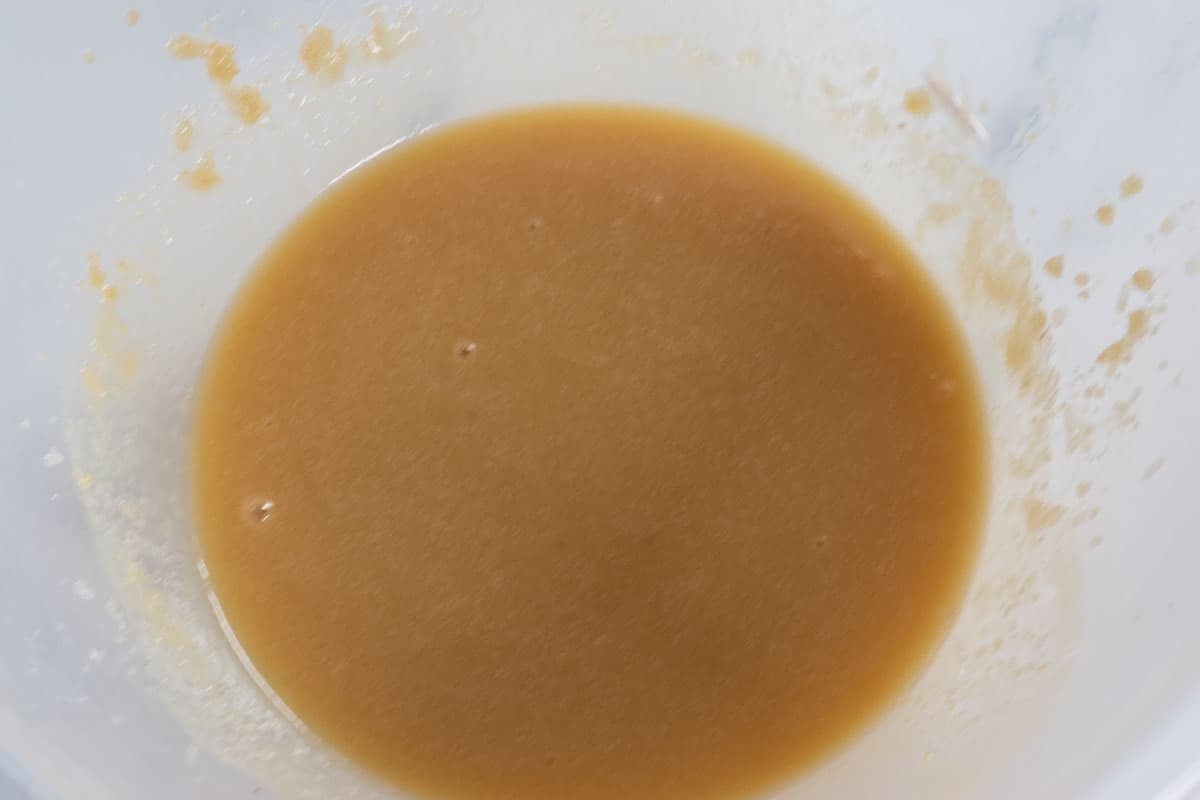 The soy milk and vanilla extract have been added to the sugar and butter mixture. 