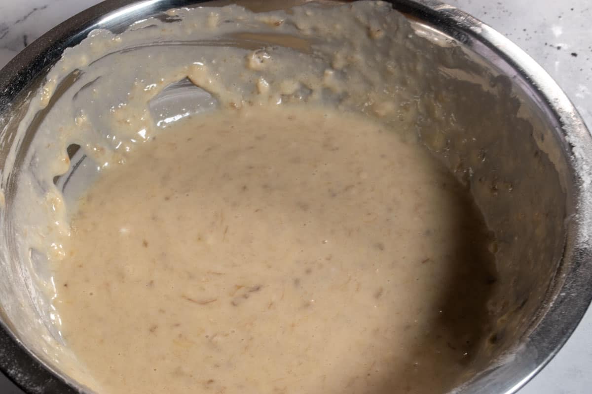 A smooth banana cake batter. All of the ingredients have been folded together. 