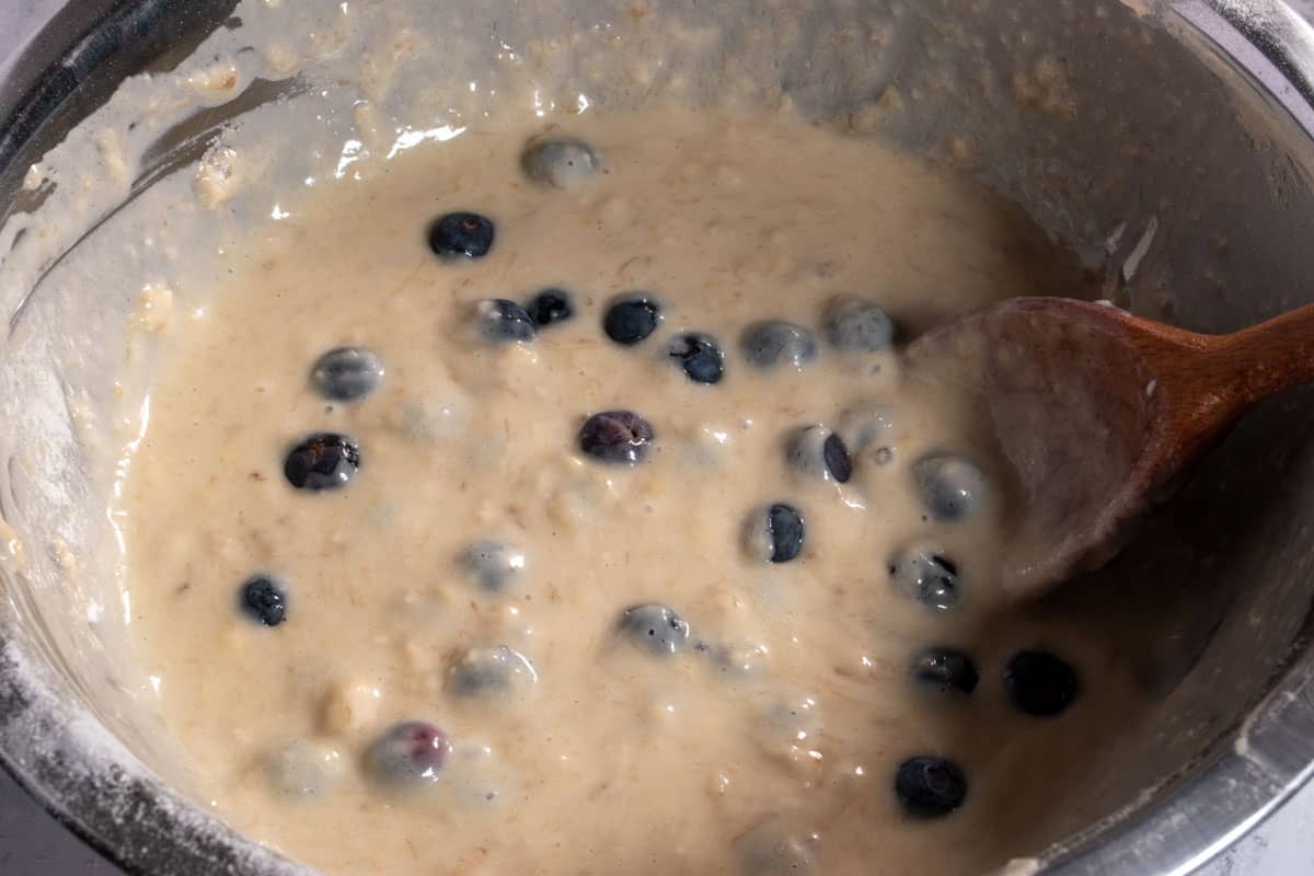 The blueberries folded into the cake batter. 