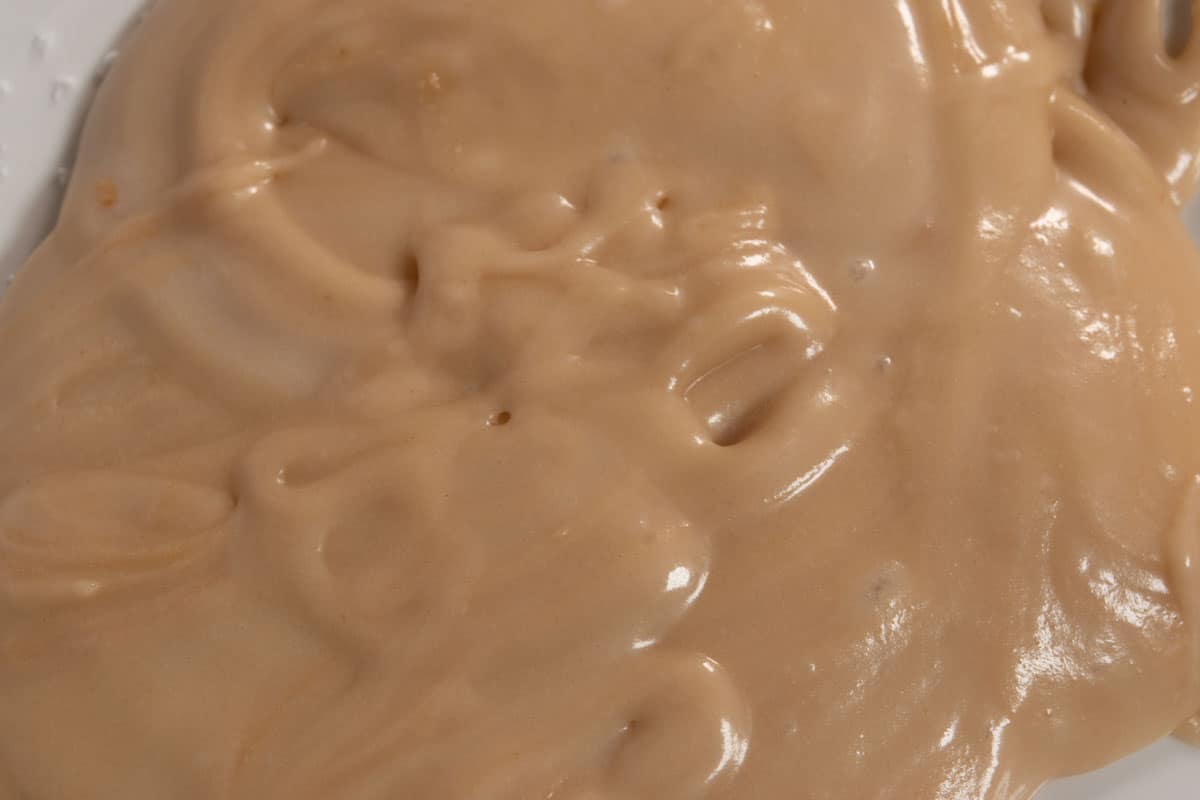 The biscoff glaze has been mixed together in a small bowl. 