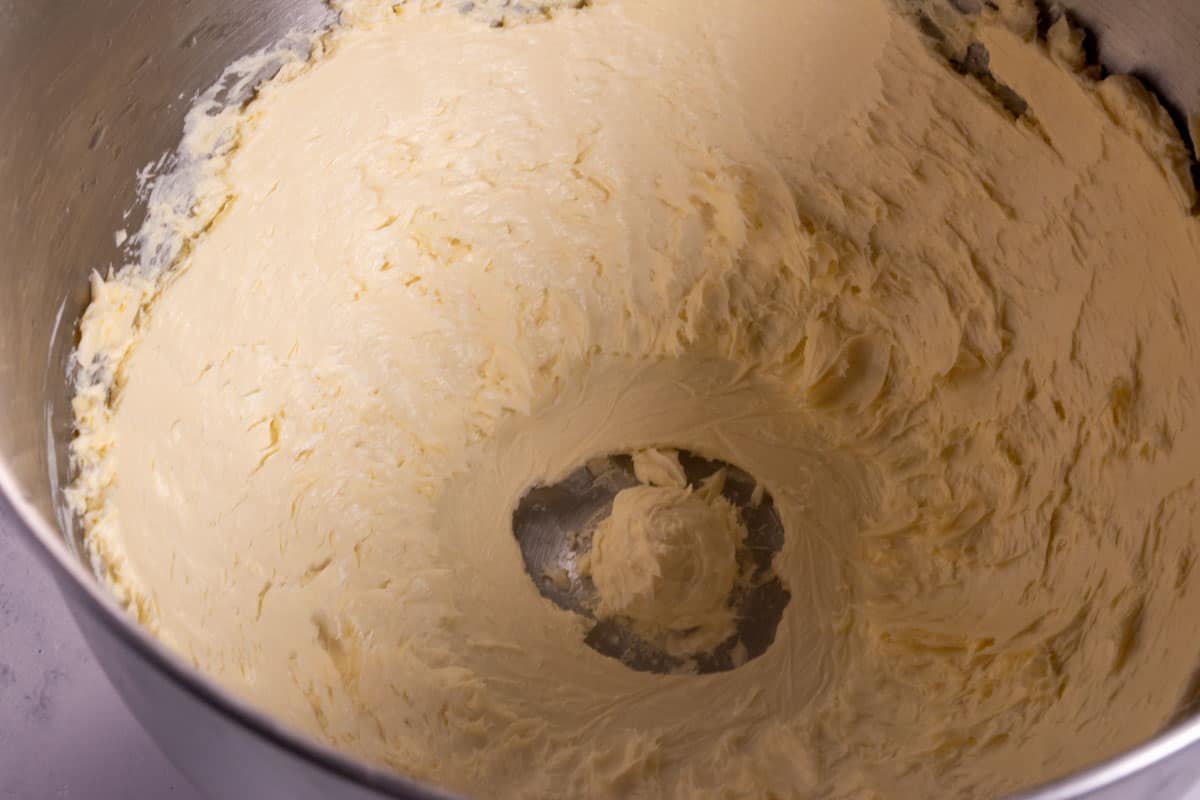 The vegan butter for the vanilla buttercream packed together inside a stand mixer after being creamed. 