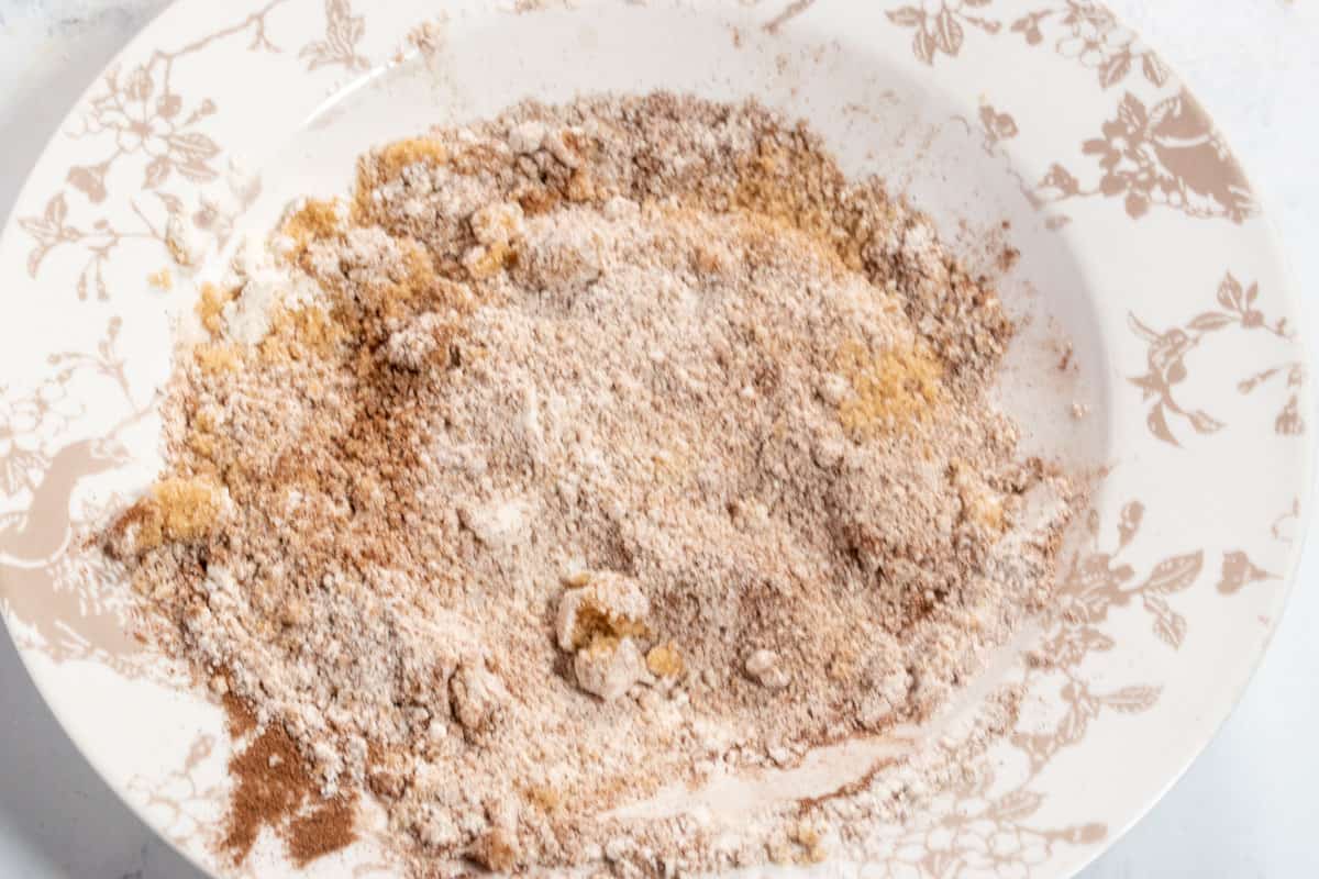 The dry ingredients for the cinnamon swirl combined in a small dish. 
