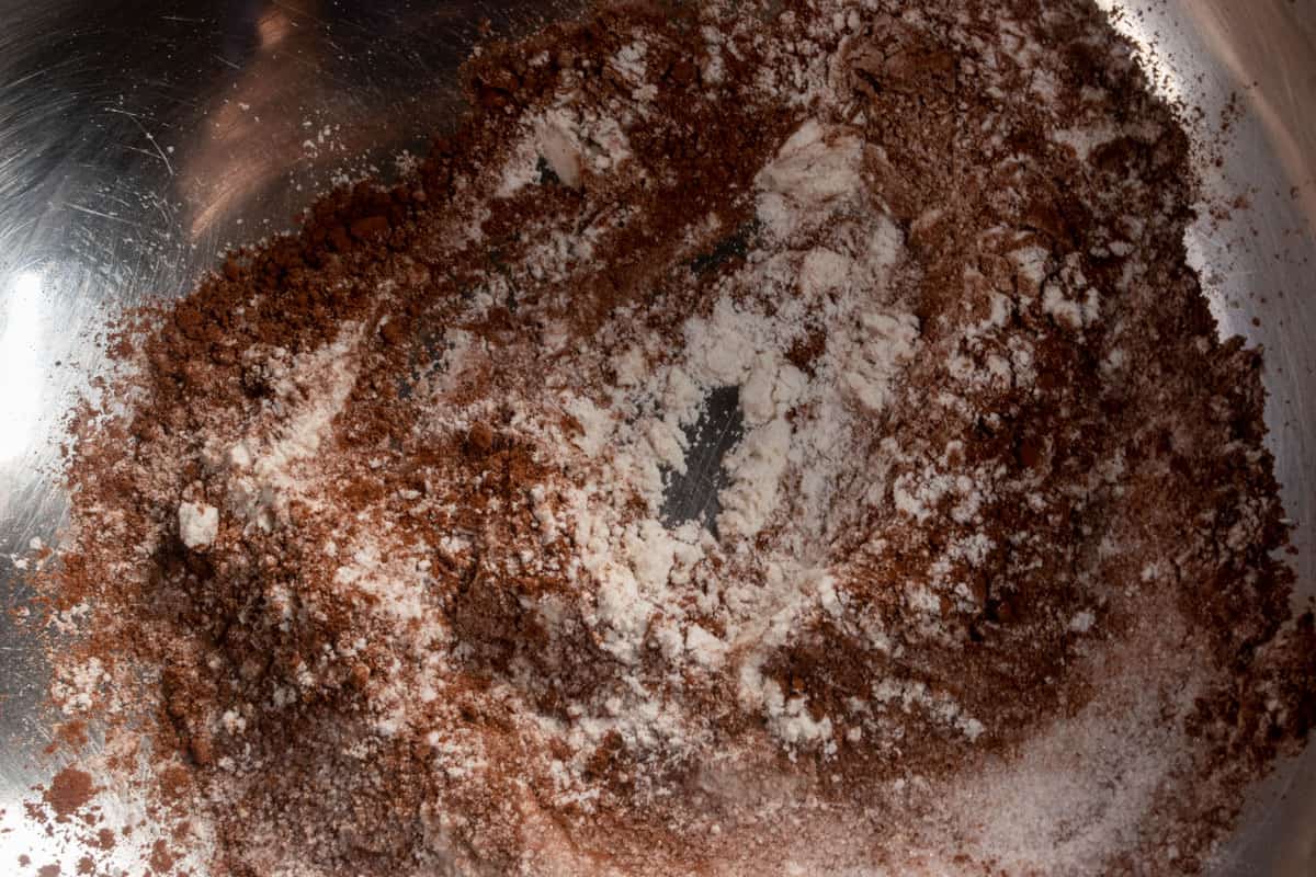 The dry ingredients for the chocolate chip mug cake combined in a mixing bowl.