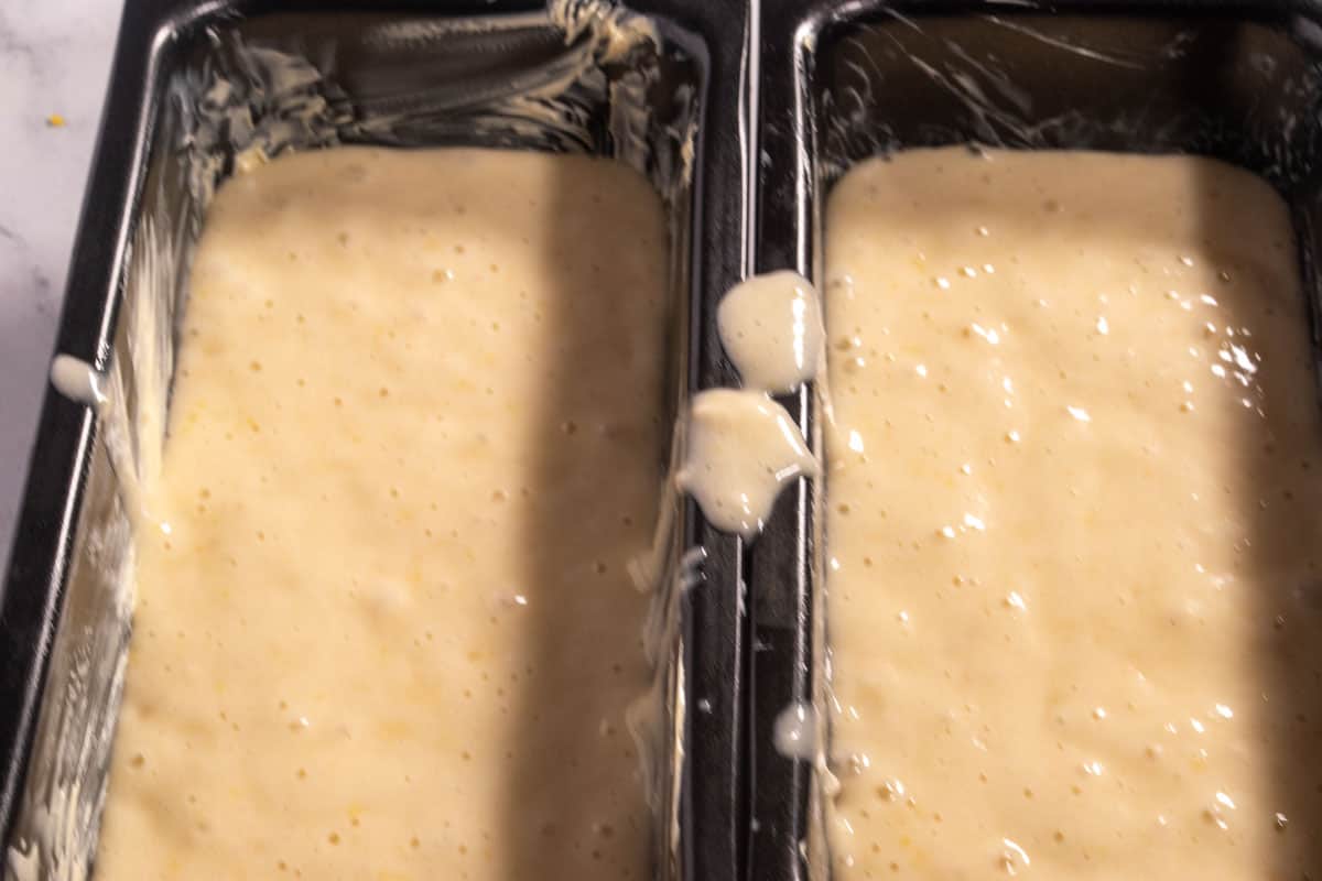 The vegan lemon olive oil cake batter, poured into the prepare tins. 