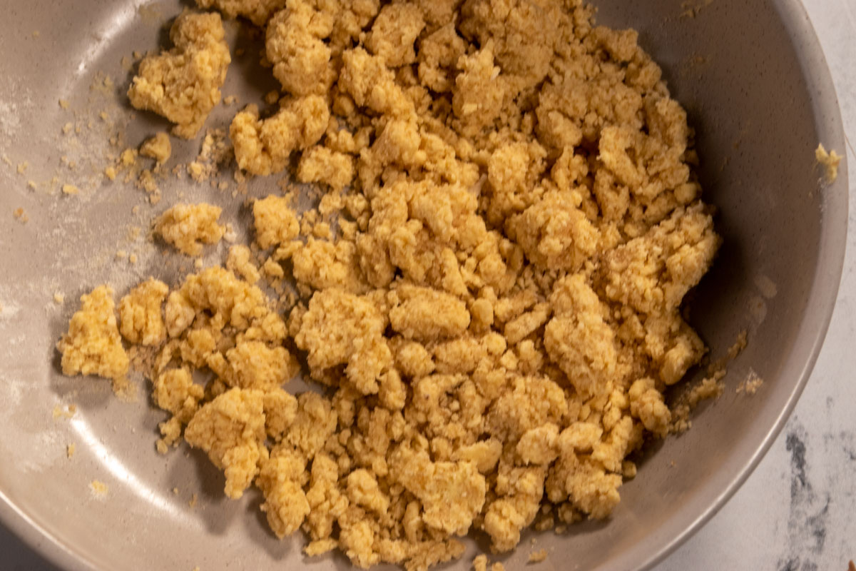 The streusel after the butter has been added. It is crumbly. 