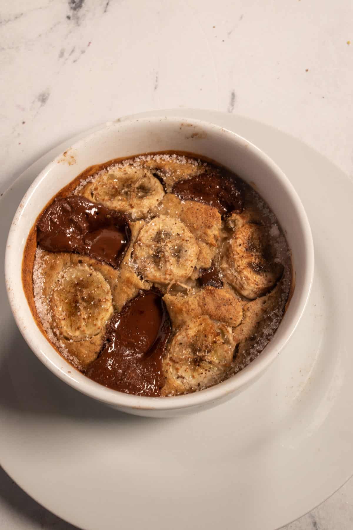 An overhead picture of the toasty oats. They have has cinnamon and granulated sugar sprinkled over them giving them a slight glow. 