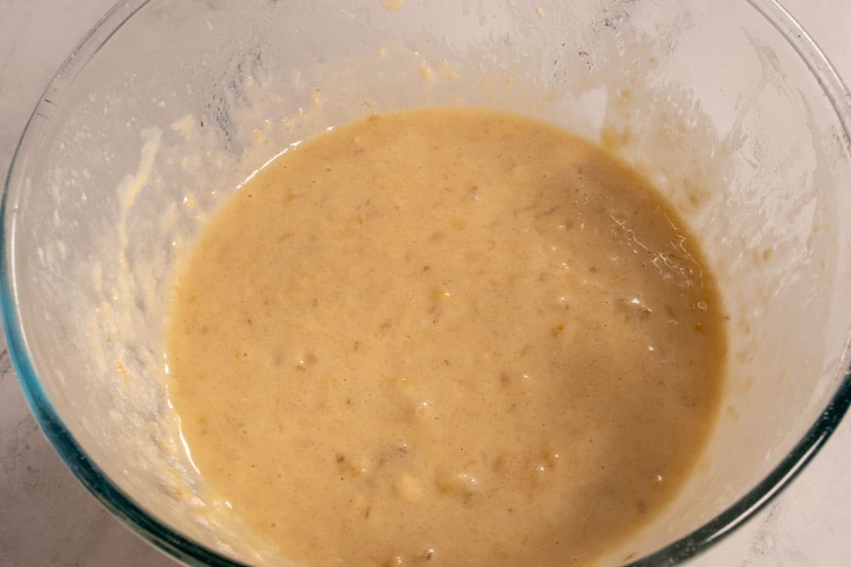 The wet ingredients, as well as the vegan buttermilk have been folding in, creating a smooth cake batter. 