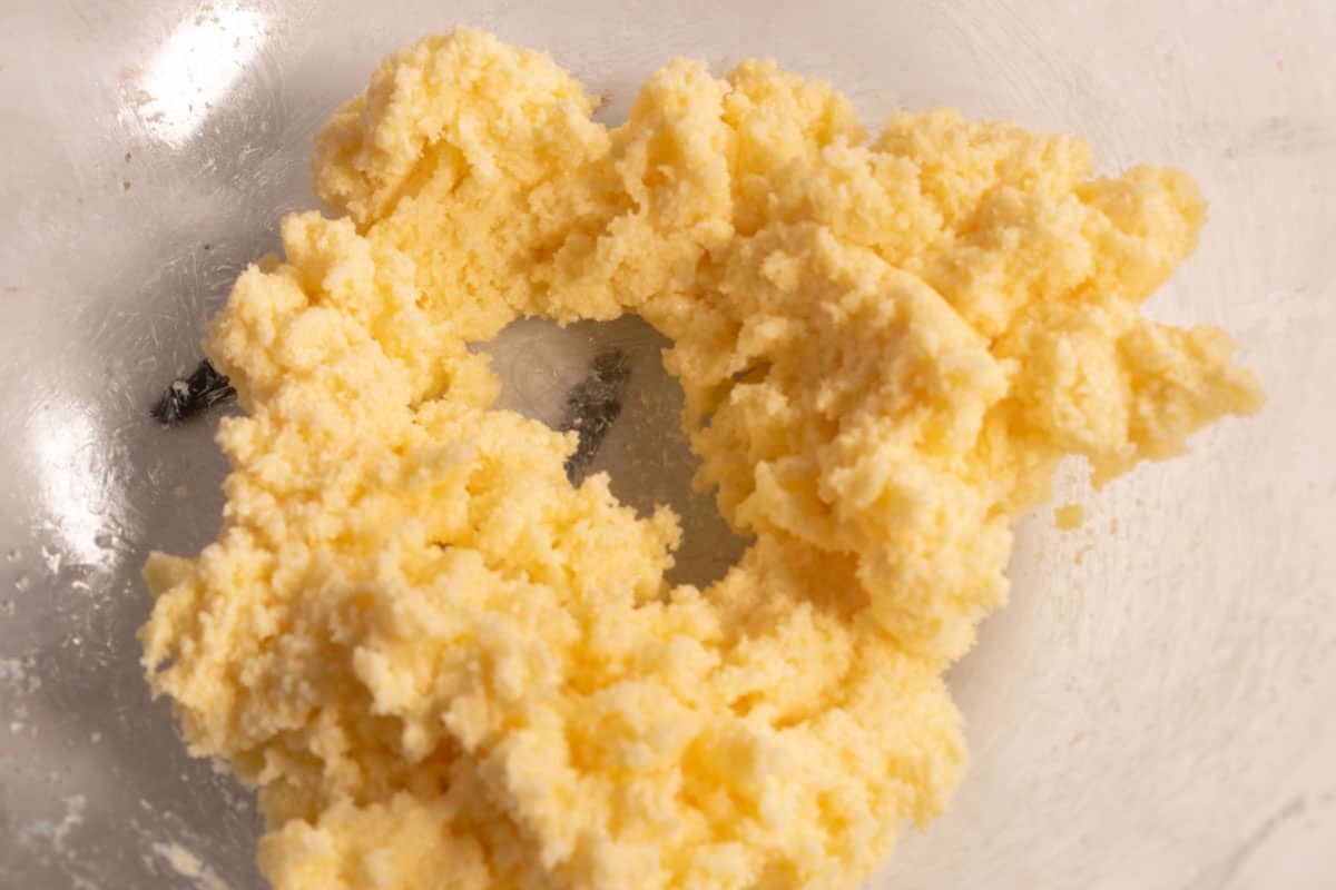The butter and sugar have been creamed together in a large mixing bowl. 