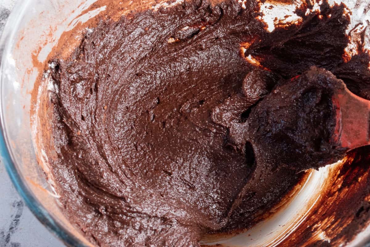 The brownie batter has been completed inside the bowl. It is creamy and smooth.