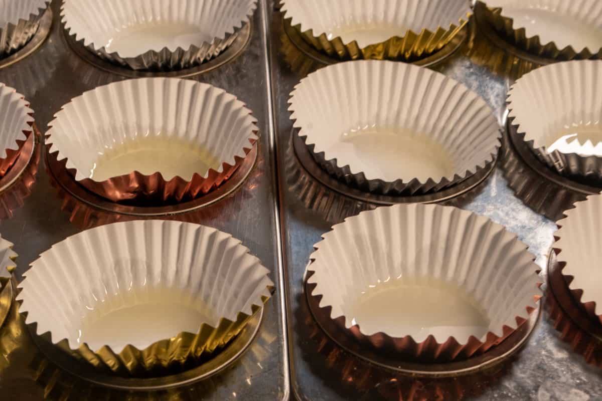 Cupcake liners greased with oil.