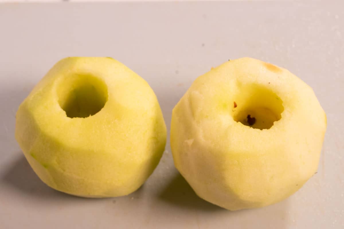 Two Granny Smith apples with the core and skin removed. 