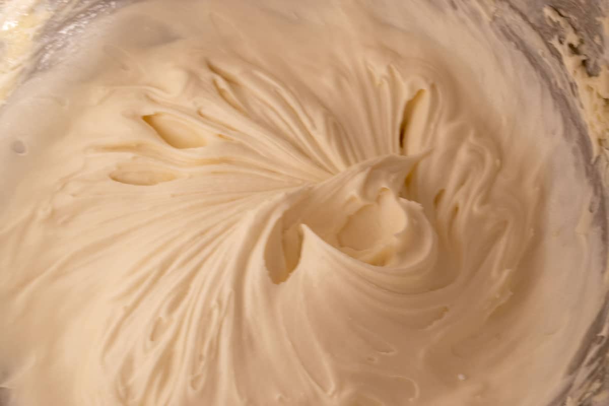 The vegan cream cheese frosting, whipped up inside a stand mixer. 