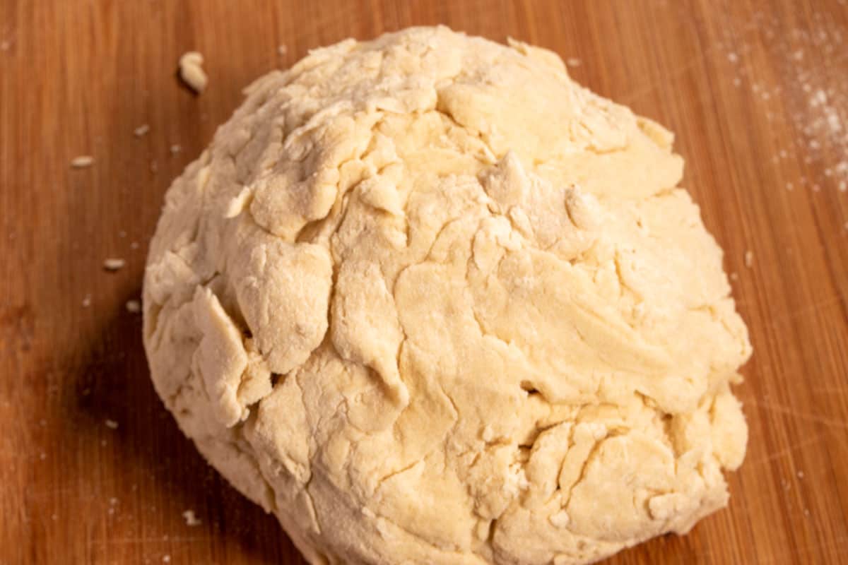 The flour has been added to the mixture and a dough ball has been formed.