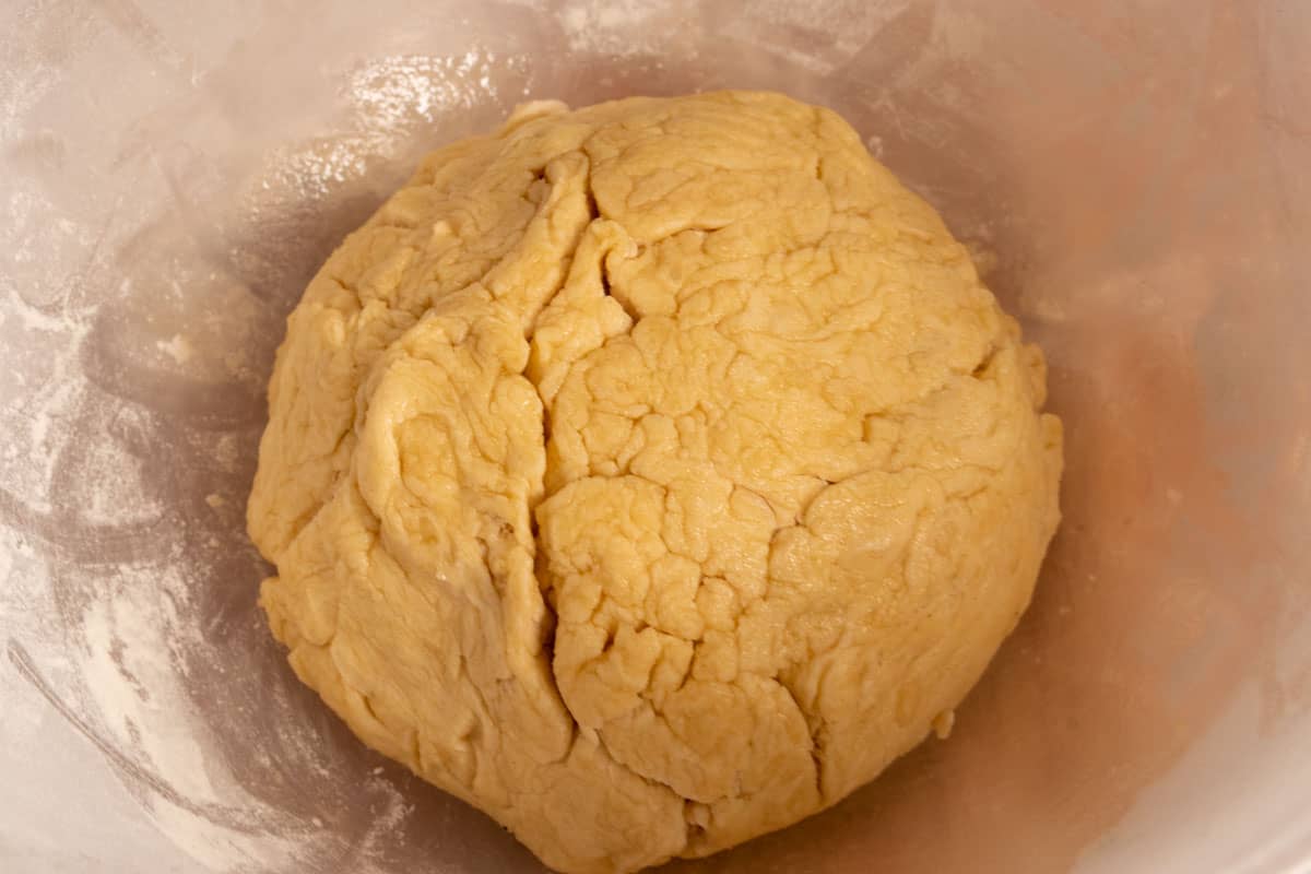 Olive oil has been rubbed over the dough ball. 