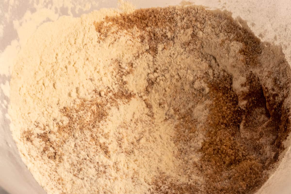The dry ingredients combined inside a large mixing bowl.