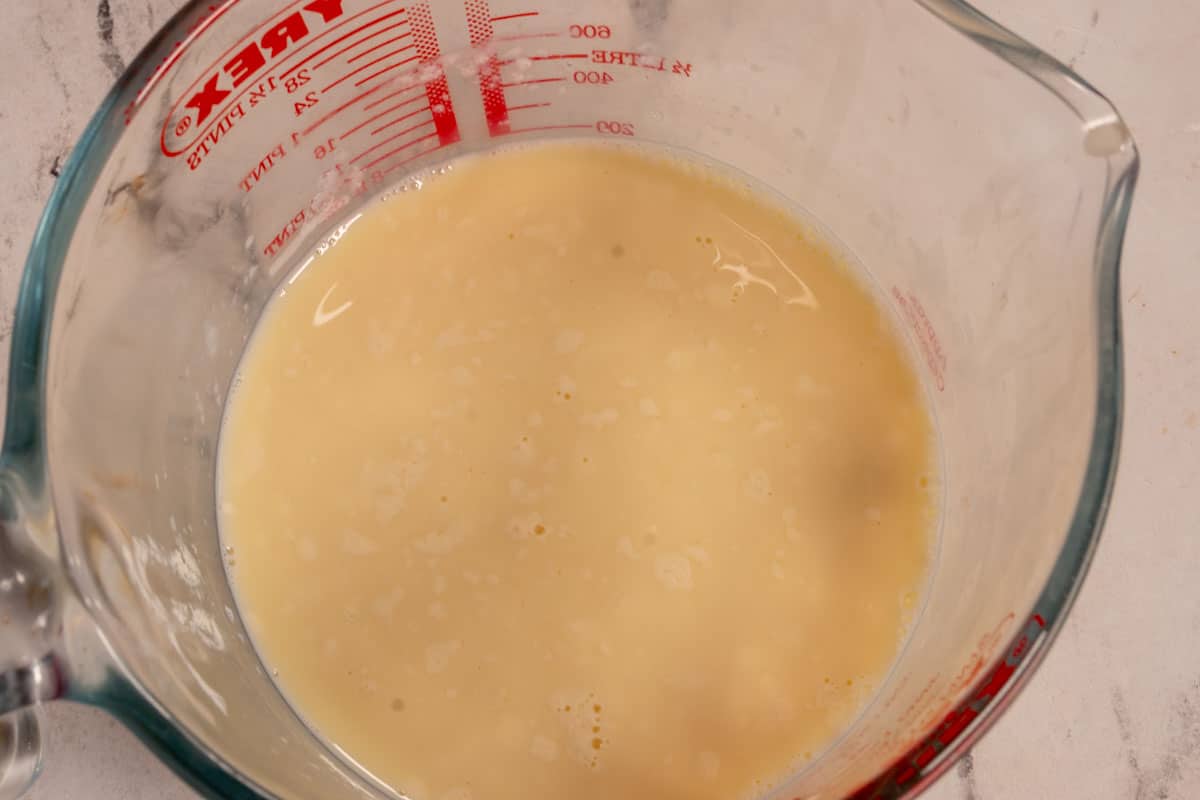 A jug of curdling vegan buttermilk. 