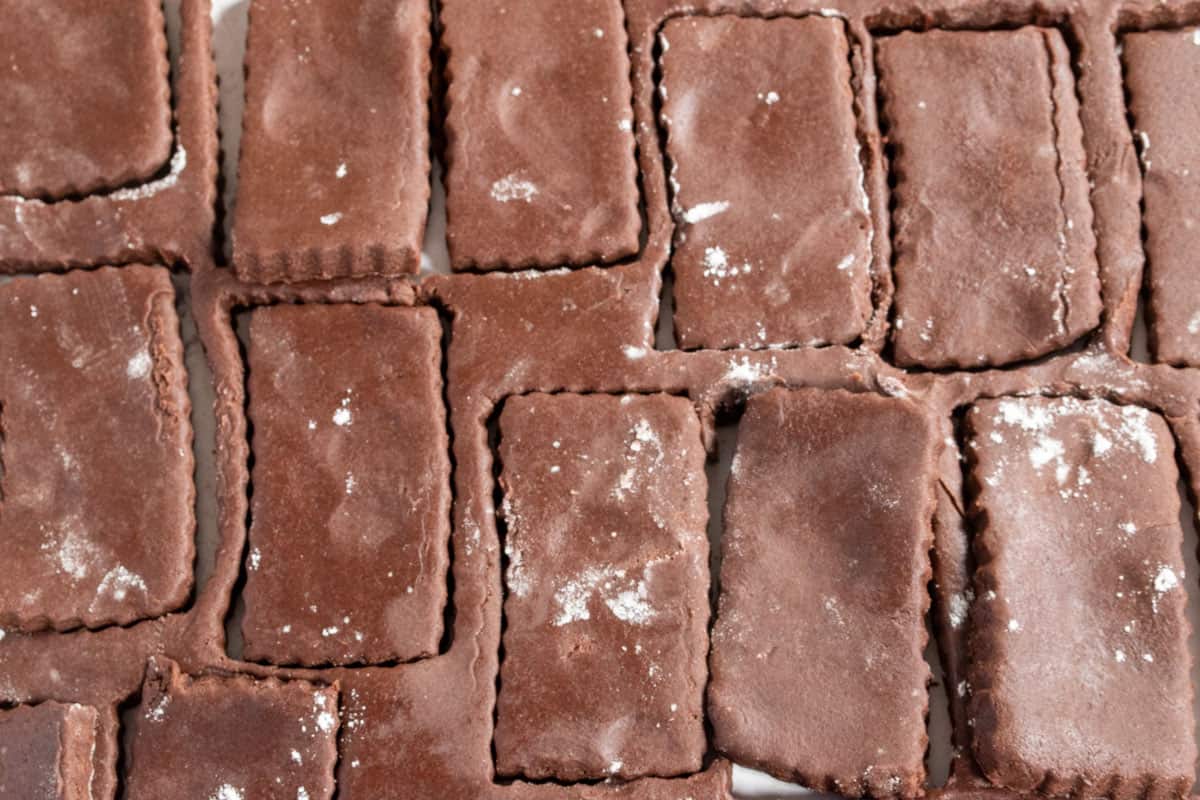 An aerial shot showing that the cookies have have cut out into a rectangular shape. 