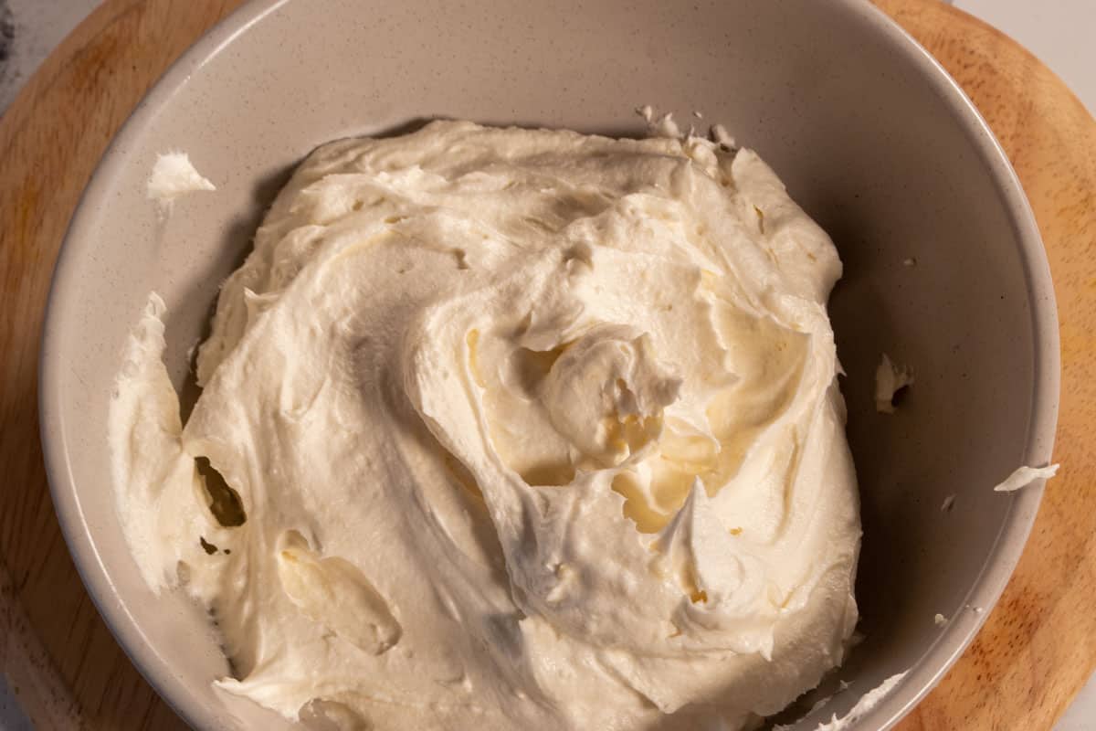 Vegan mascarpone frosting inside a small bowl. 