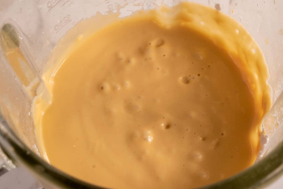 The remaining filling ingredients have been added to the blender, creating a yellow custard filling. 