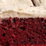 A close up shot showing one of my vegan red velvet bars which has a beautiful, soft texture.