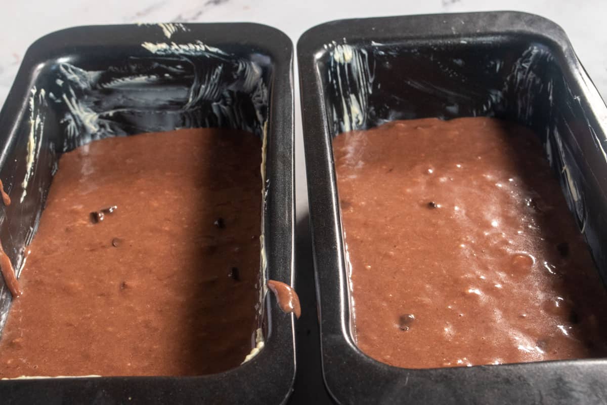 The chocolate banana bread batter has been poured into the tins. 