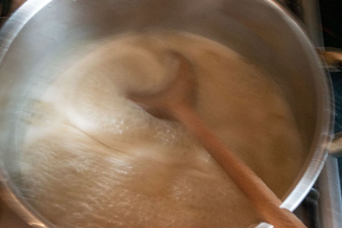 The mixture being brought to a boil.