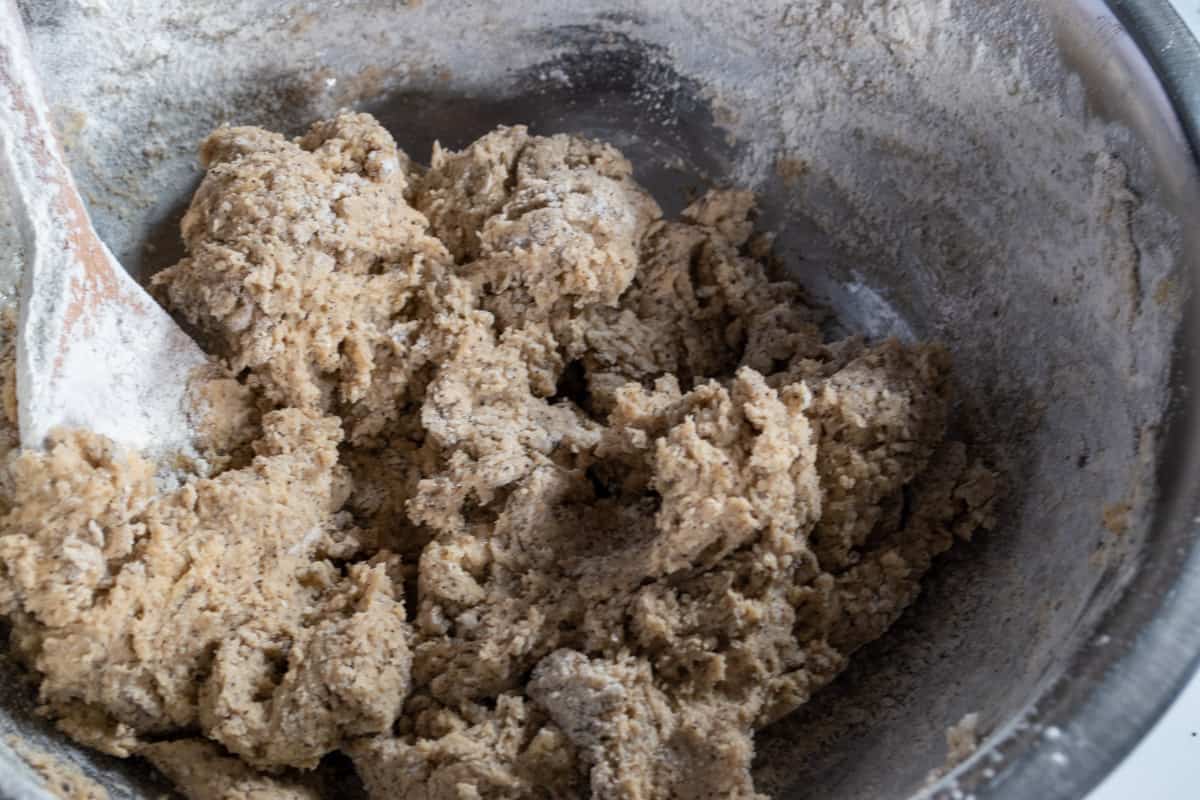 The ingredients from both bowls have now been combined, creating a cookie dough. 