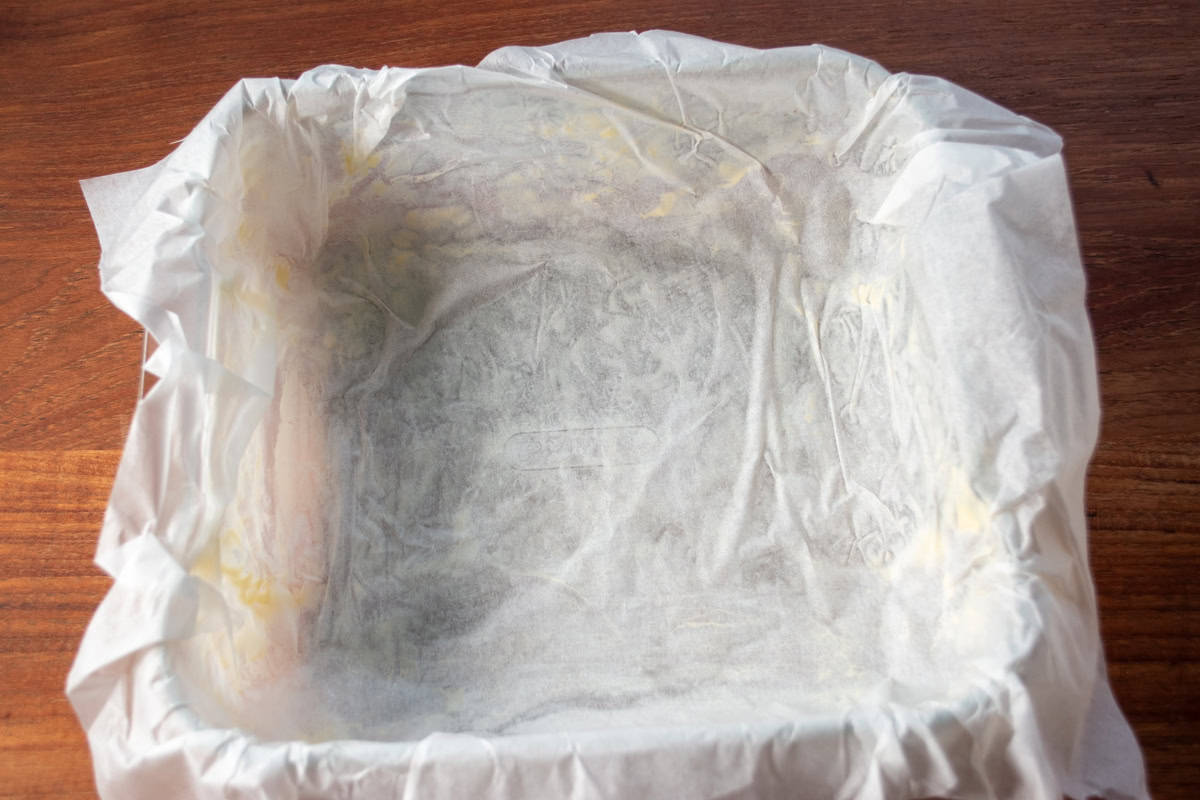 A lined, square baking tin. 